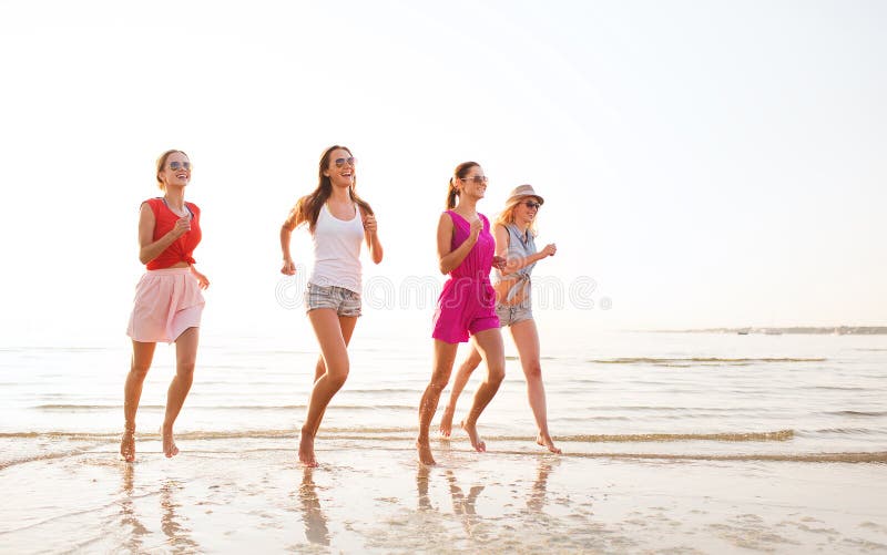 Group of Smiling Women Running on Beach Stock Image - Image of pretty ...