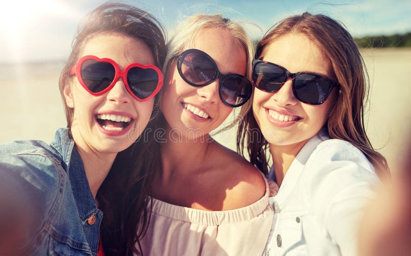 Group Of Smiling Women Taking Selfie On Beach Stock Image Image Of 