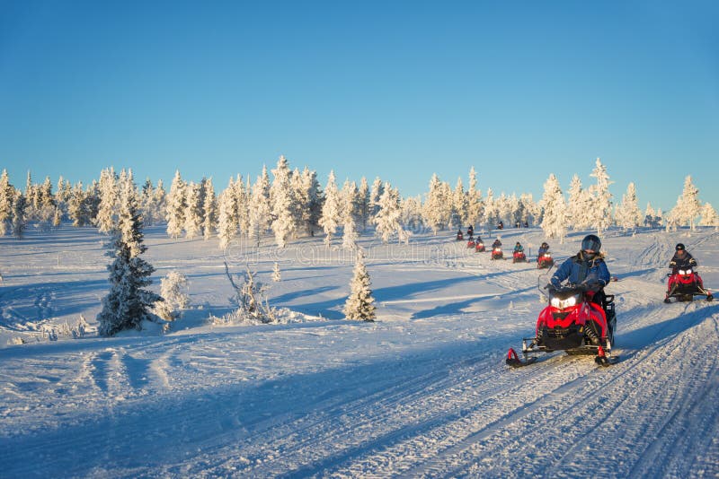 Group of snowmobiles in Lapland, near Saariselka Finland