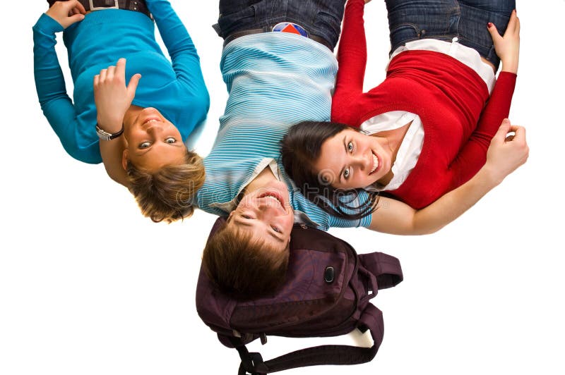 Group of students having fun, laying on white