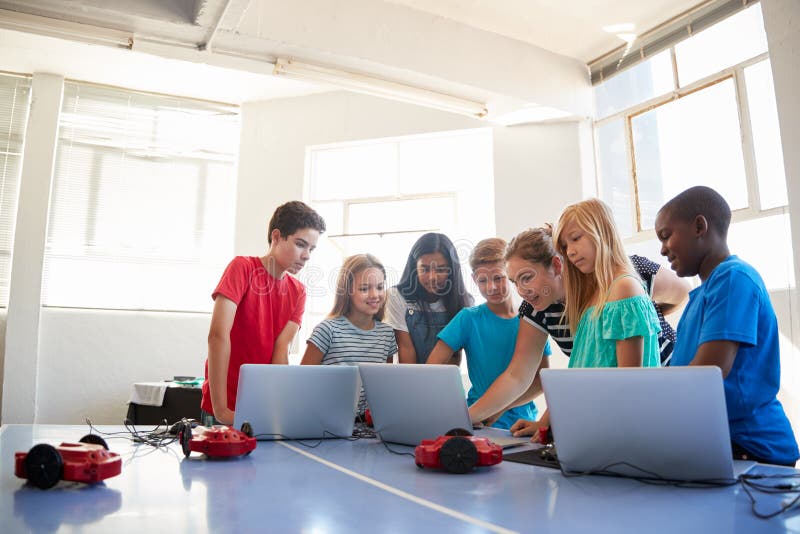 Group of Students in after School Computer Coding Class Learning To ...