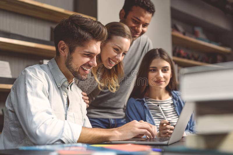 Group of students studying together stock photos