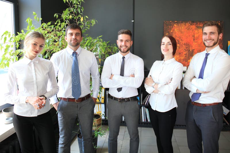 Group of successful business people on the background of the office royalty free stock photos Group of successful business people on the background of the office royalty free stock photos
