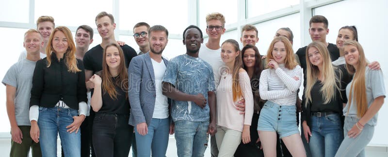 Group of successful young people standing together. royalty free stock images