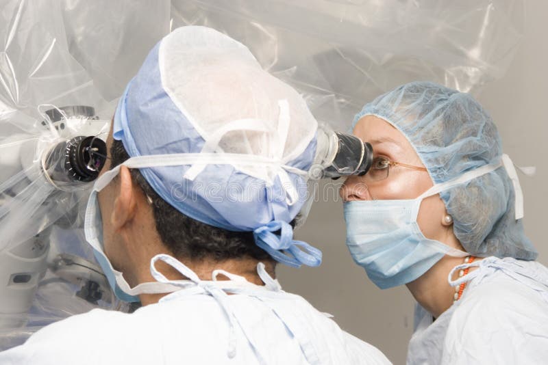 Group Of Surgeons Operating stock photography