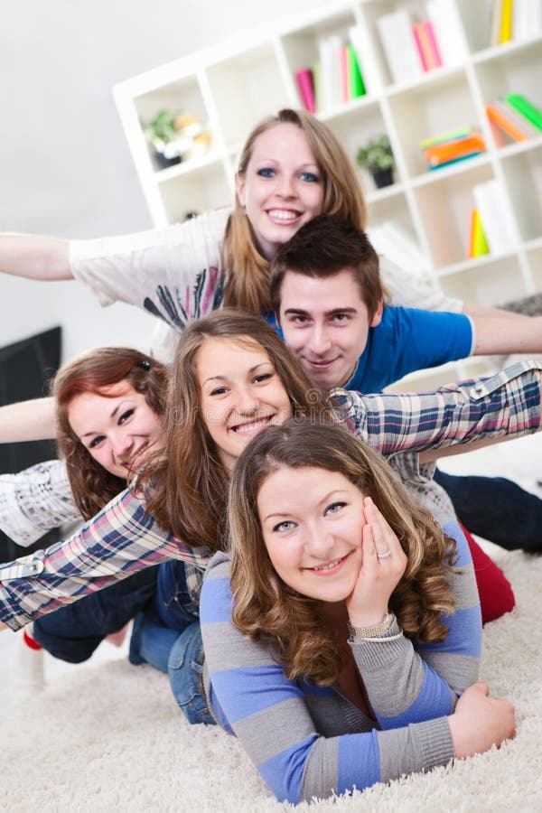 Group Of Teenagers Having Fun Indoor Stock Image - Image of happy, arms