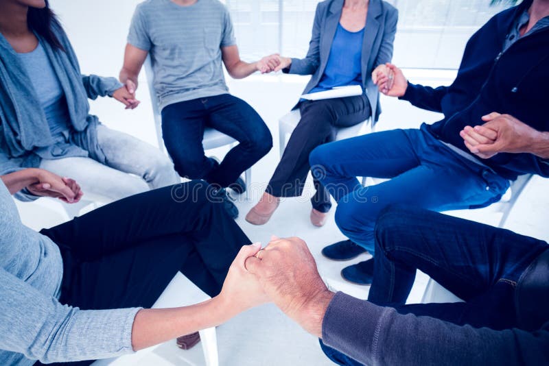 Group Therapy In Session Sitting In A Circle Stock Photo Image 54775488