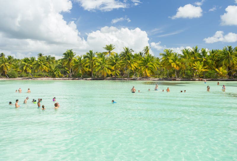A Group of Tourists in the Caribbean Sea near Saona Island, Punta Cana, Dominican Republic.