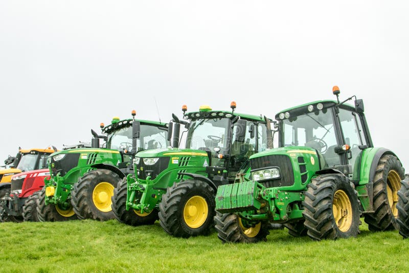 A Group of Tractors Parked Up Editorial Stock Photo Image of group
