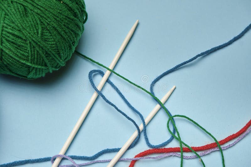 Group of Various Yarn Balls and Knitting Needles Closeup Stock Image