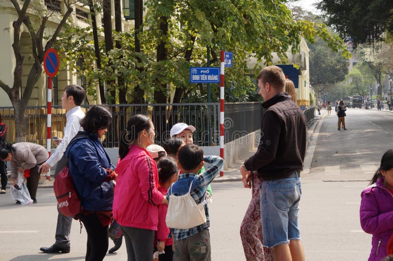 Vietnamese child with a foreign couple stock image Vietnamese child with a foreign couple stock image