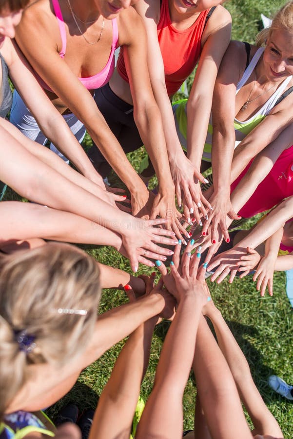 Group of women putting their beauty hands together stylish colorful nails art manicure royalty free stock image Group of women putting their beauty hands together stylish colorful nails art manicure royalty free stock image