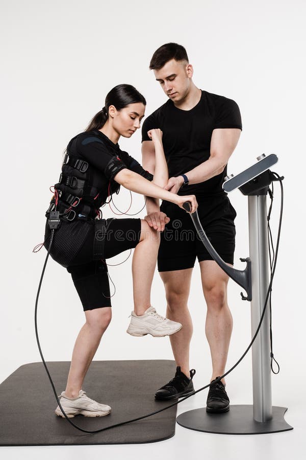 Group Workout Training in EMS Suit, Which Applies Electrical Impulses