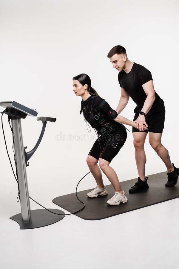 Group Workout Training in EMS Suit, Which Applies Electrical Impulses