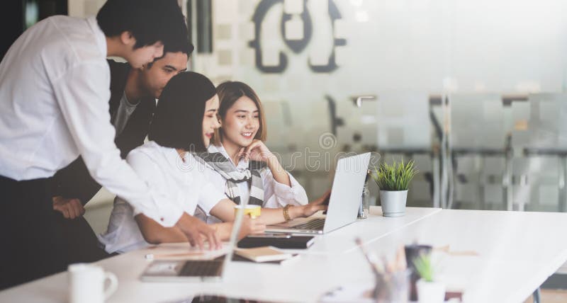 Group of young Asian business people brainstorming the ideas stock photos Group of young Asian business people brainstorming the ideas stock photos