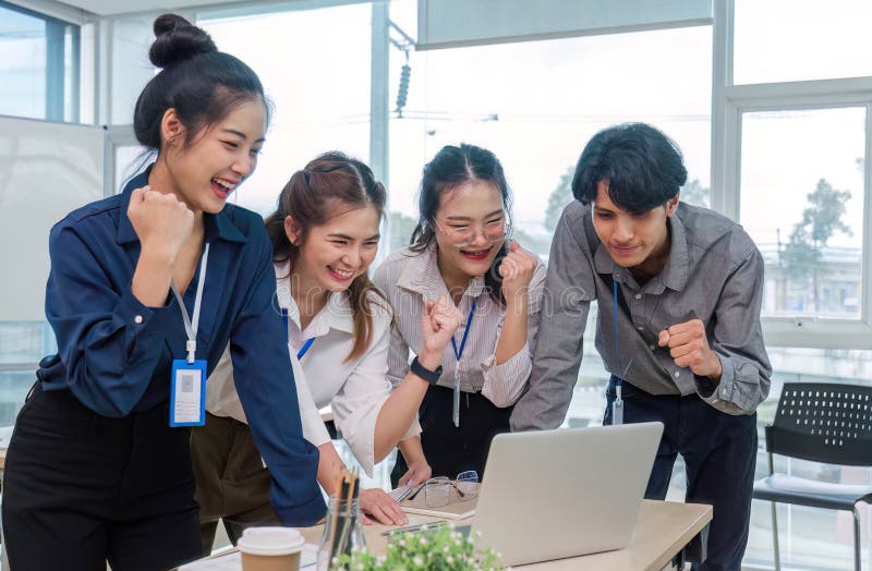 Group of Young Asian business team creative businesspeople coworker in office Happy to be successful partnership royalty free stock photos