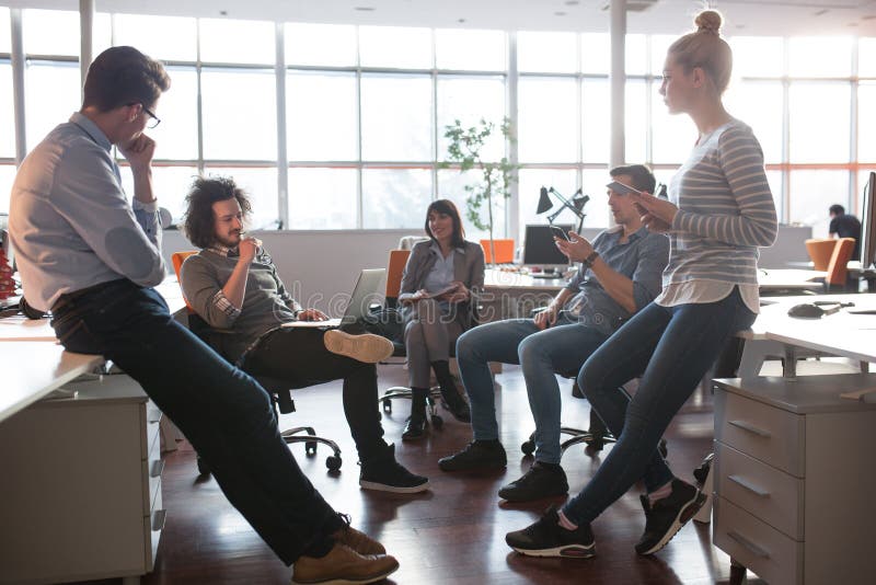 Young Business Team At A Meeting at modern office building. Financial, interacting.