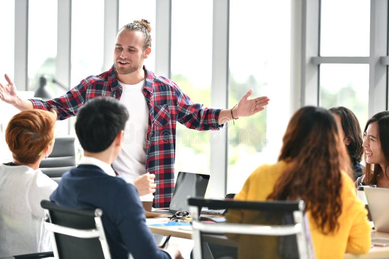 Group of Young Businesspersons Having Discussion Stock Image - Image of ...