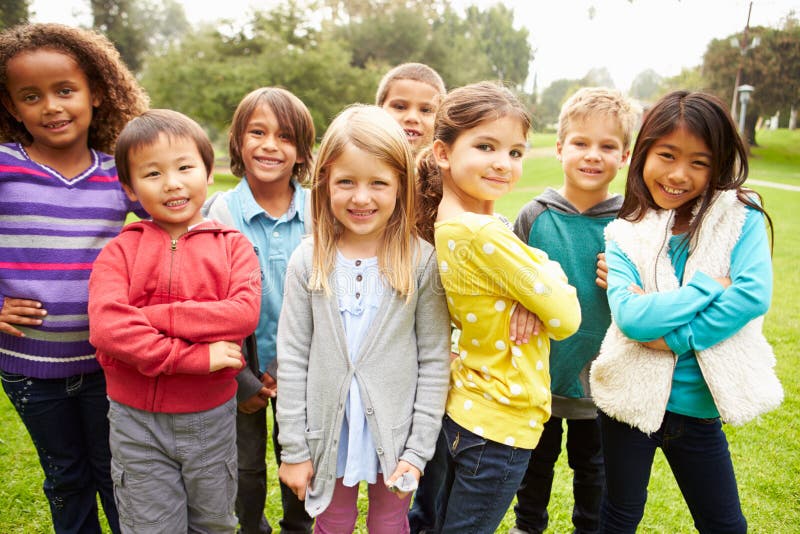 Group Of Young Children Hanging Out In Park