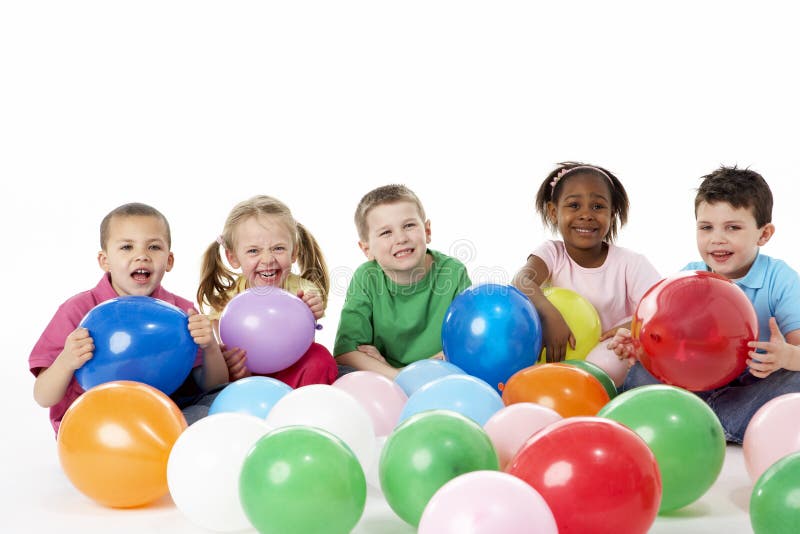 Group Of Young Children In Studio With Balloons royalty free stock images Group Of Young Children In Studio With Balloons royalty free stock images