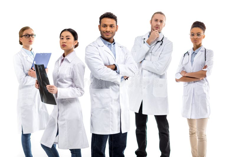 Group of Young Confident Professional Doctors in White Coats Standing