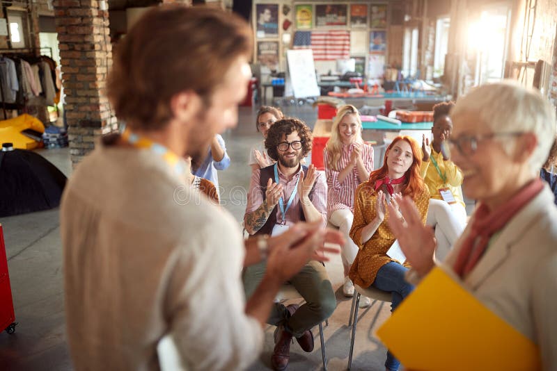 A Group Of Young Creative People Are Congratulating On A Well Done Presentation In The Office Employees Office Work Stock Photo Image Of Company Audience