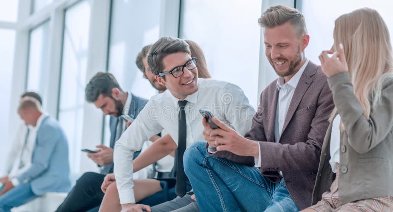 Group of young employees discussing online news. stock images Group of young employees discussing online news. stock images