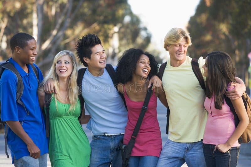 Group of young friends chatting outside stock photography Group of young friends chatting outside stock photography