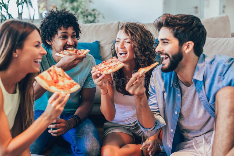 Three Friends Eating Pizza Stock Photo, Picture and Royalty Free Image.  Image 10735477.