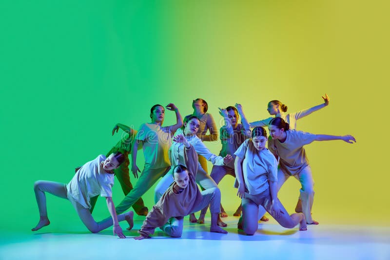 Group of Young People Dancing Contemp Against Green and Yellow Gradient ...