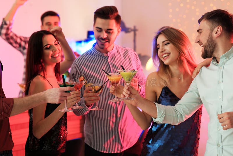 Group of Young People Holding Martini Cocktails Stock Photo - Image of ...