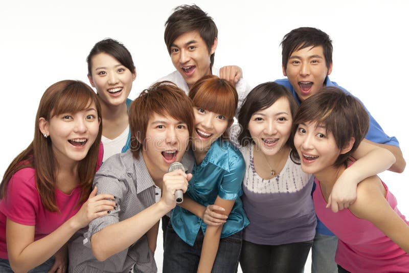 A Group of Young People Singing Stock Image - Image of excitement