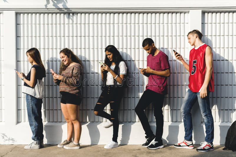 Group of young teenager friends chilling out together