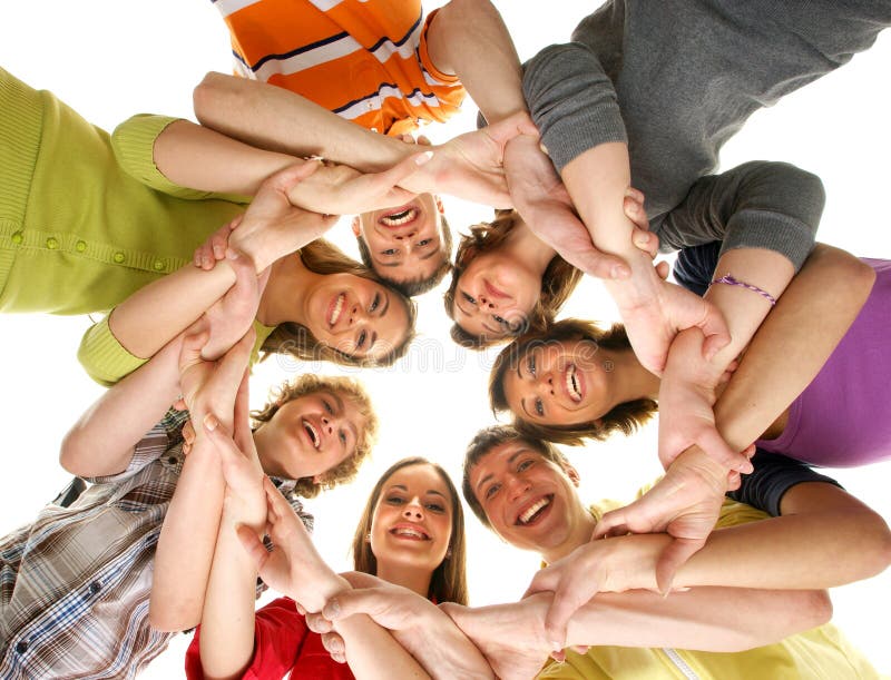 A group of young teenagers holding together stock photos