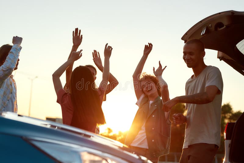 dancing outside the car