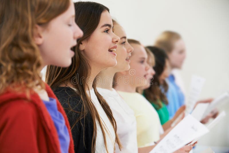 School Children Singing In Choir Together. School Children Singing In Choir Together