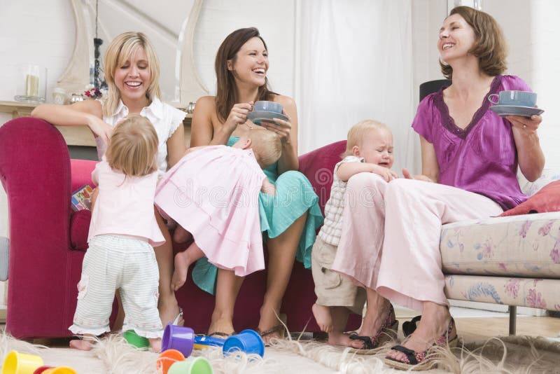 Group of mothers having coffee while looking after toddlers. Group of mothers having coffee while looking after toddlers