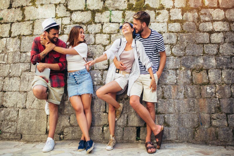 Happy group of tourists traveling and sightseeing together. Happy group of tourists traveling and sightseeing together