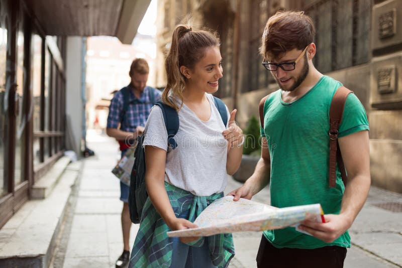 Happy group of tourists traveling and sightseeing together. Happy group of tourists traveling and sightseeing together