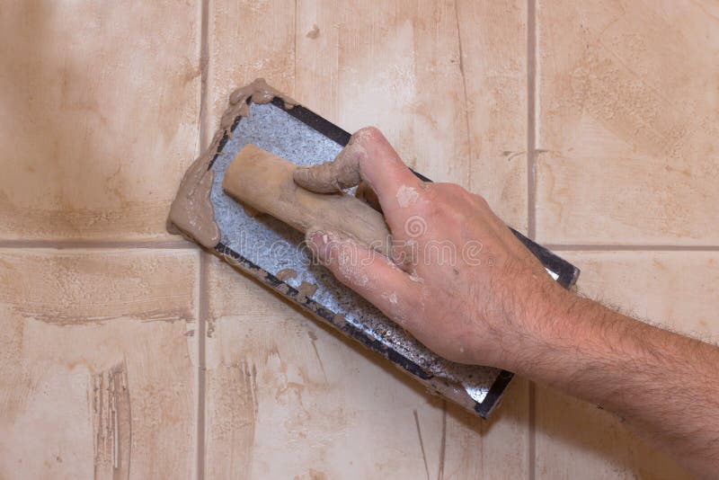 Man Grouting Ceramic Tile In Bathroom Stock Image Image of wall