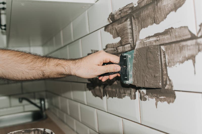 Grouting Tiles in the Kitchen. Repair Stock Image Image of geometric