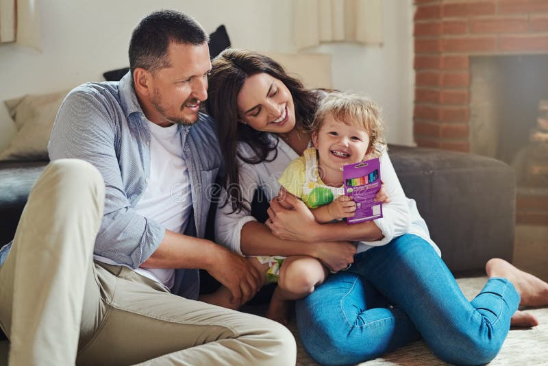 Growing Up, Children Need Love and Affection. a Young Mother and Father ...