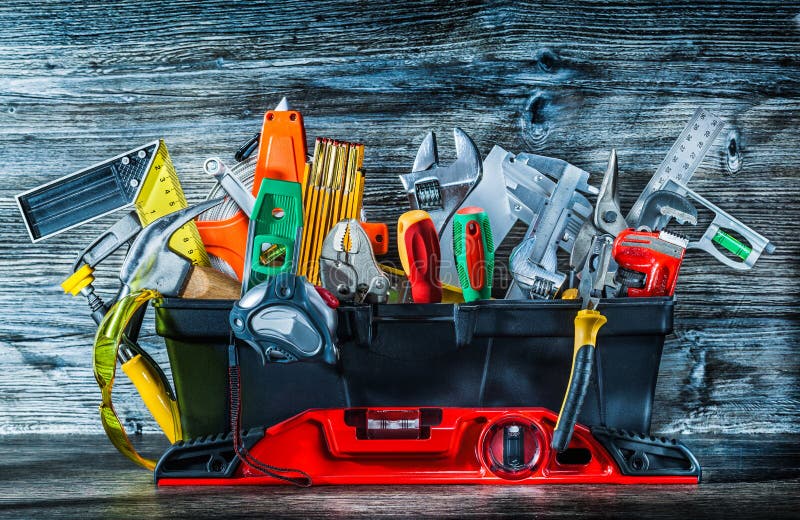 großer Satz Bauwerkzeuge im Werkzeugkasten auf Weinleseholz lizenzfreie stockfotografie großer Satz Bauwerkzeuge im Werkzeugkasten auf Weinleseholz lizenzfreie stockfotografie