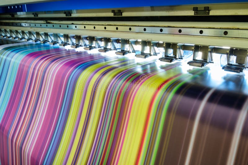 Large inkjet printer working multicolor cmyk on vinyl banner. Large inkjet printer working multicolor cmyk on vinyl banner