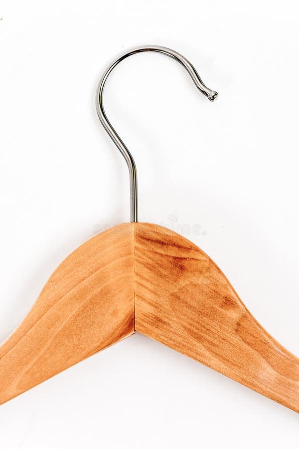 Gruccia per vestiti di legno su fondo bianco fotografia stock Gruccia per vestiti di legno su fondo bianco fotografia stock