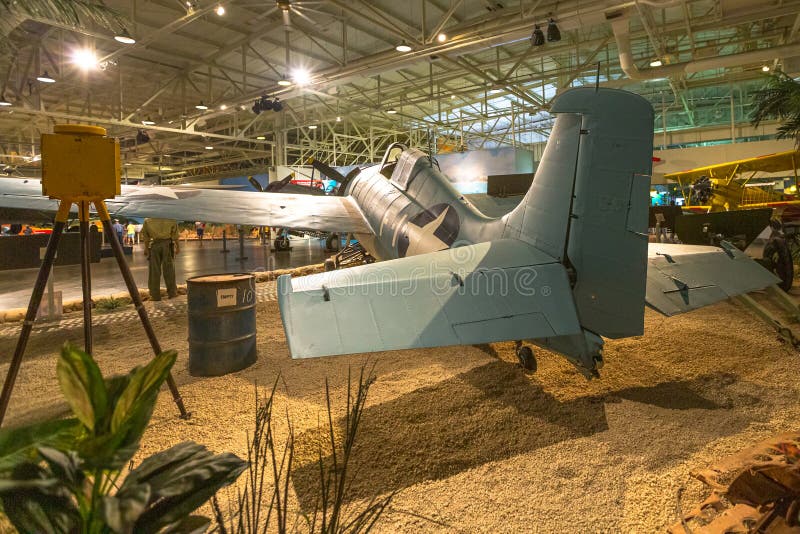 Honolulu, Oahu, Hawaii, United States - August 2016: American US Air Force aircraft Grumman F4F-3 Wildcat Fighter of 1942 in Hangar 37 of the Pearl Harbor Aviation Museum of Hawaii. backside view. Honolulu, Oahu, Hawaii, United States - August 2016: American US Air Force aircraft Grumman F4F-3 Wildcat Fighter of 1942 in Hangar 37 of the Pearl Harbor Aviation Museum of Hawaii. backside view