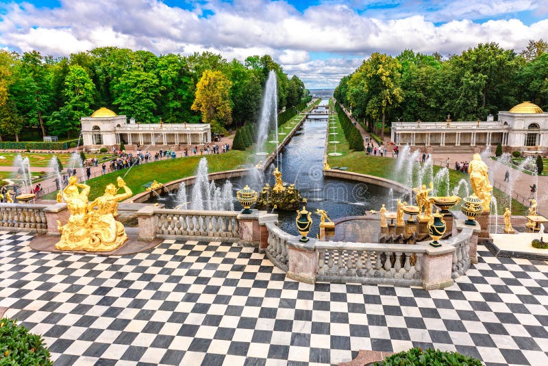 St. Petersburg, Russia - August 23, 2023: Fountains of Peterhof. View of Grand Cascade from Grand Palace. Golden statues, Samson Fountain in Lower park of Petrodvorets. St. Petersburg, Russia - August 23, 2023: Fountains of Peterhof. View of Grand Cascade from Grand Palace. Golden statues, Samson Fountain in Lower park of Petrodvorets