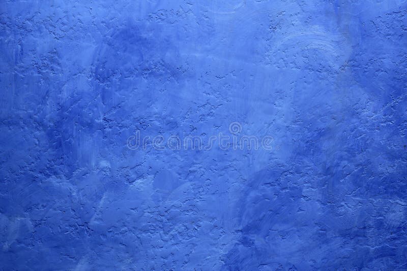 Grunge blue painted wall texture background