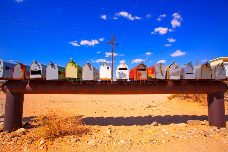 Grunge mail boxes in California Mohave desert USA