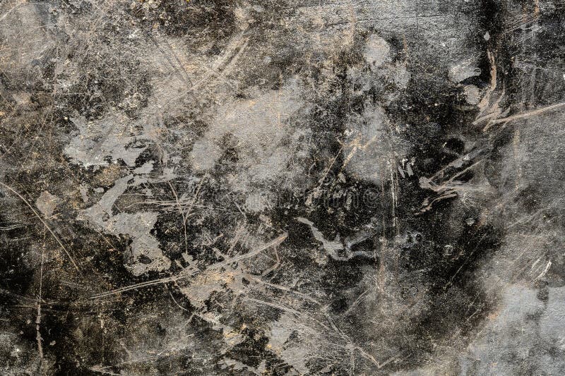 Grunge old black metal background or texture with scratches and cracks, close up, top view. Grunge old black metal background or texture with scratches and cracks, close up, top view